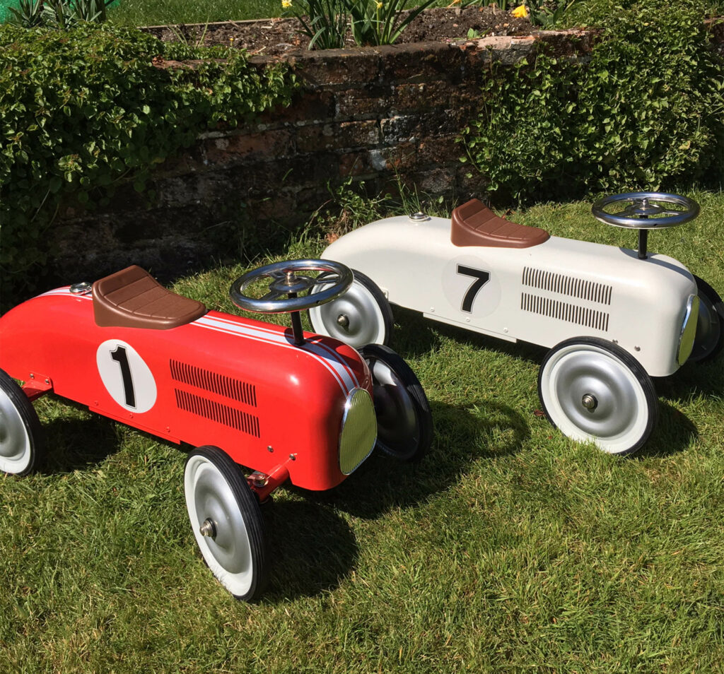 Pair of metal racing cars for toddlers to hire Southampton parties